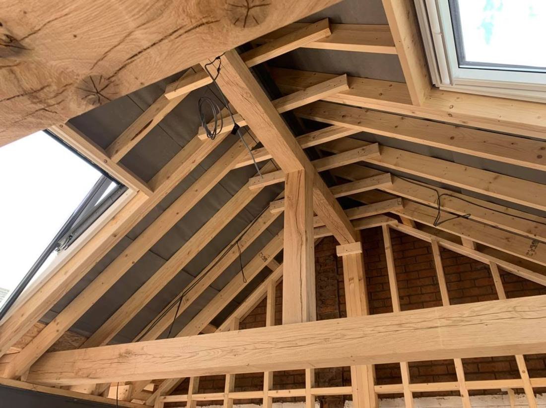 Oak beams and roof timbers inside a new extension