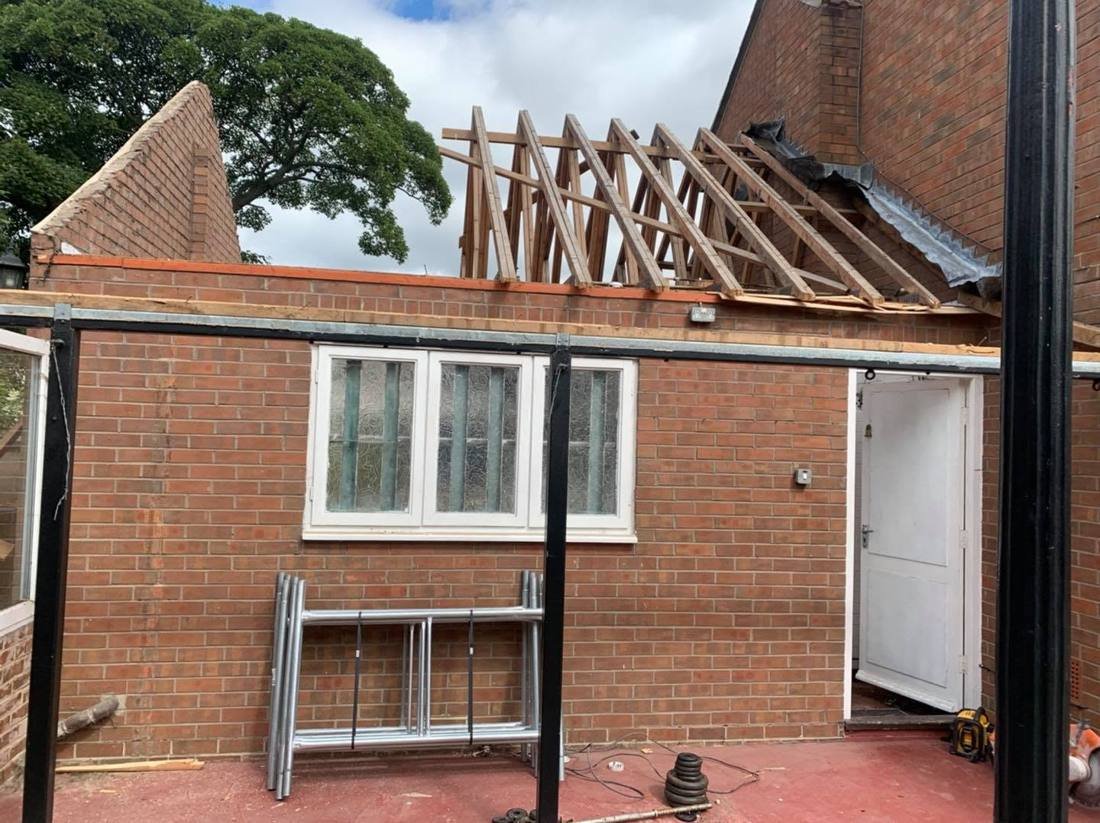 Roof trusses exposed during a single storey rebuild