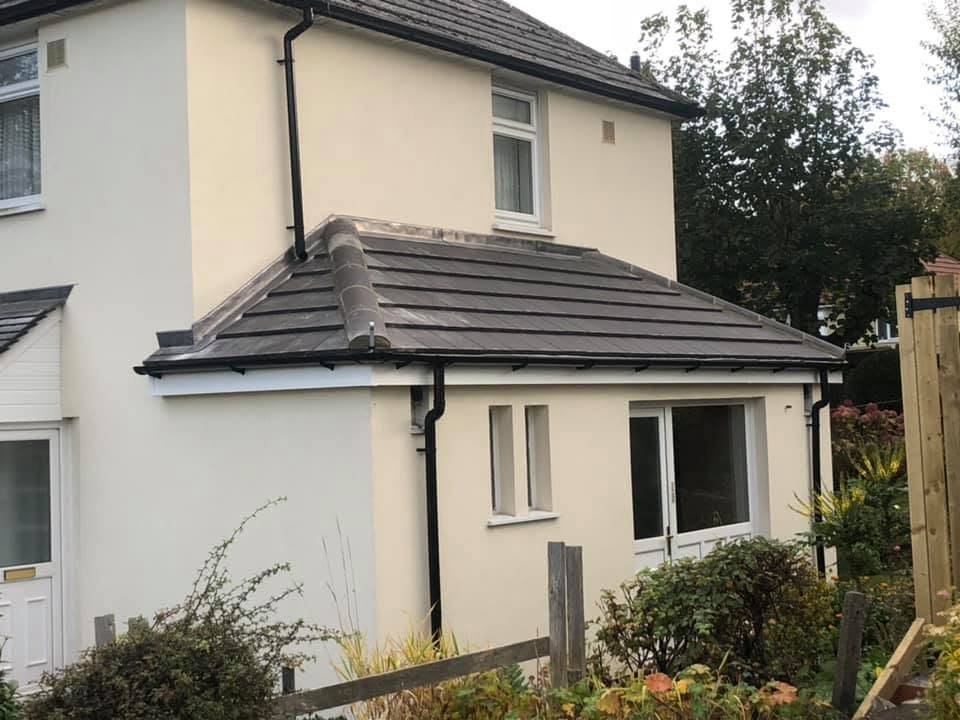Side extension with hipped tiled roof